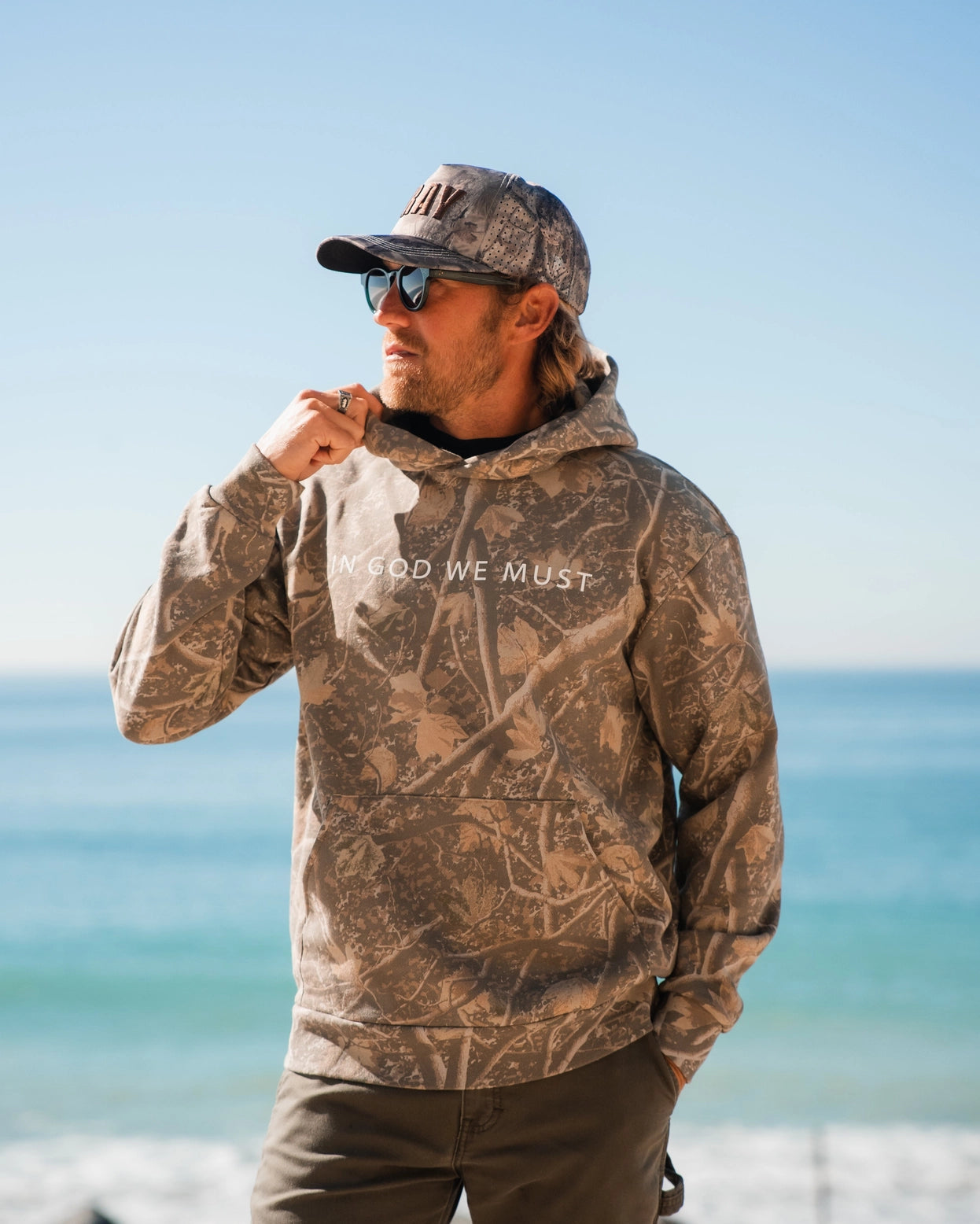 The In God We Must Camo Hoodie