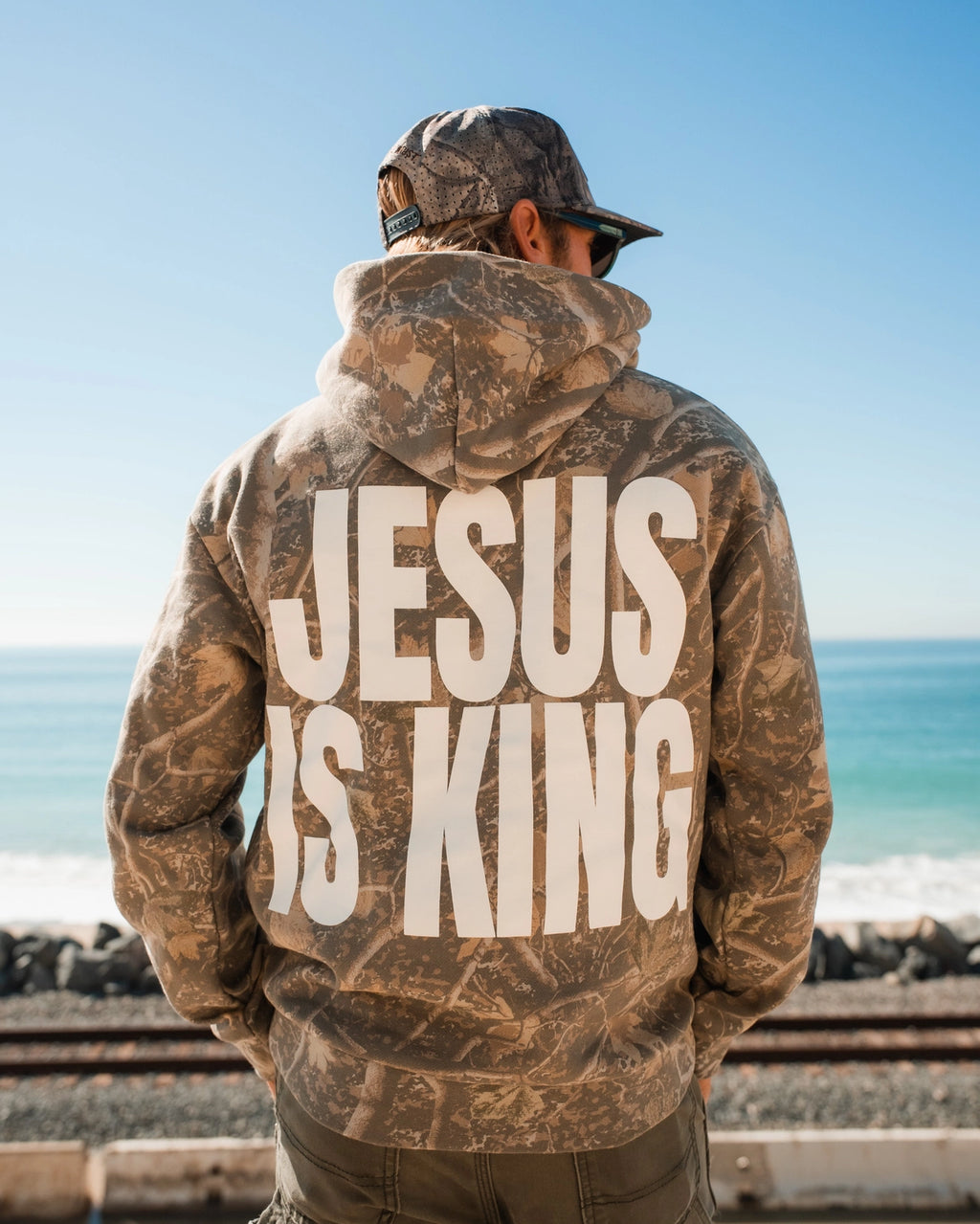 The In God We Must Camo Hoodie